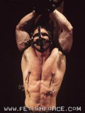 Muscular slave man Bryce Pierce in gag mask getting tortured by Robert Black