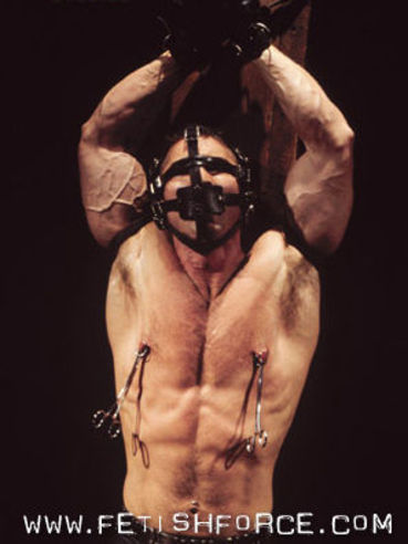 Muscular slave man Bryce Pierce in gag mask getting tortured by Robert Black