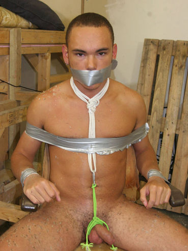 Naked bondage boy Zack Green is tied to chair and makes no secret of his dick