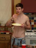 Topless guy Brett Fyre in low jeans is about to flash his dick in the kitchen