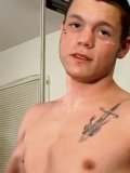 Gorgeous straight skater Boomer Jacoby watches himself in a mirror stroking his hard cock