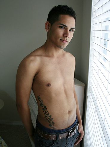 Cute Latin guy Damien strips and demonstrates the seducing nude body with tattoos