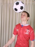 Young inked Reese bfcollection plays around with a soccer ball & shows off his pierced cock 