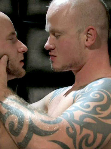 Two gay men with shaved head, tattoos and piercing Brandon X and Drake Jaden enjoy the fun