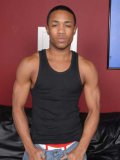 Gay guy Mike Rodriguez shows his love for interracial anal sex on the black couch and cums
